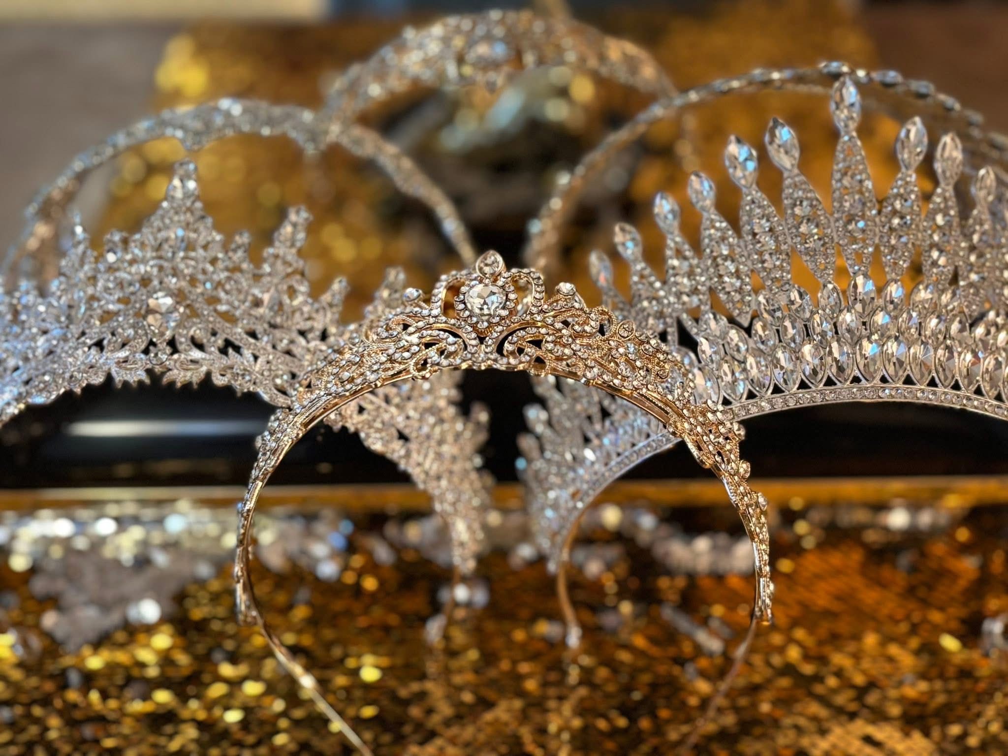 The crowns of Stella Reign glittering under the lights