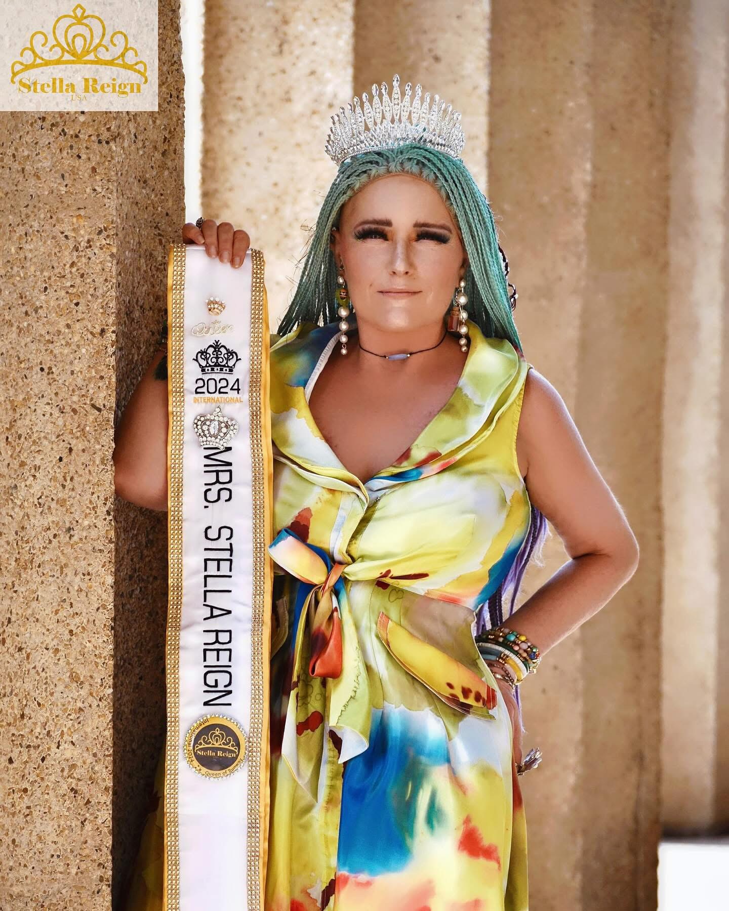 Nikki Harper, Mrs. Stella Reign International 2024, holding her sash